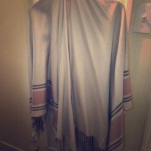 OS fits all poncho. Never been worn.